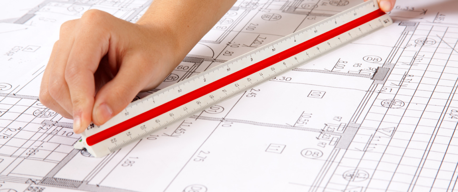 scale ruler on blueprints